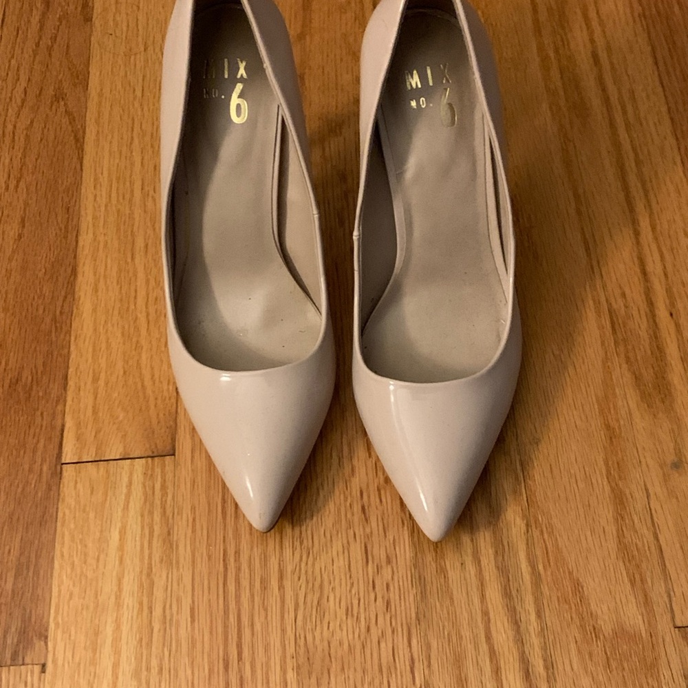Tan patent leather pumps